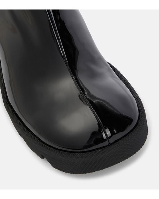 Bottes Stride En Cuir Burberry en coloris Black