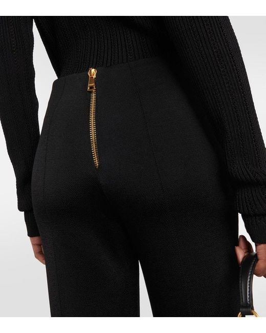 Pantalones Flared En Punto De Tiro Alto Balmain de color Black