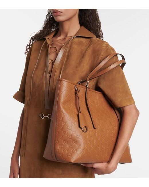 Gucci Brown Tote Bag Emblem Gg Aus Leder