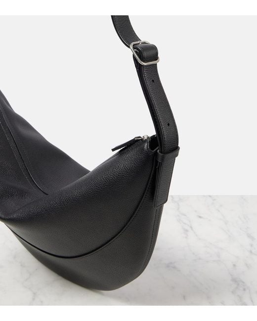 The Row Jouve Leather Crossbody Bag in Black | Lyst