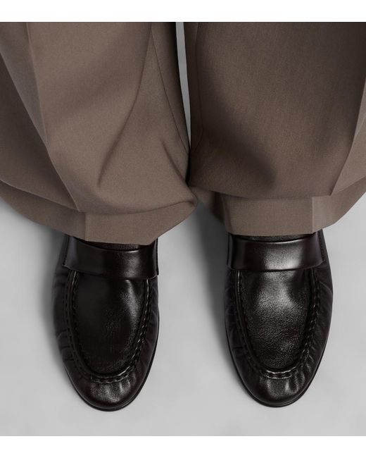 The Row Black Soft Leather Penny Loafers