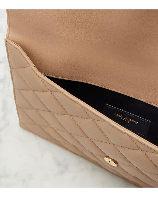 Bustina Cassandre di Saint Laurent in Natural