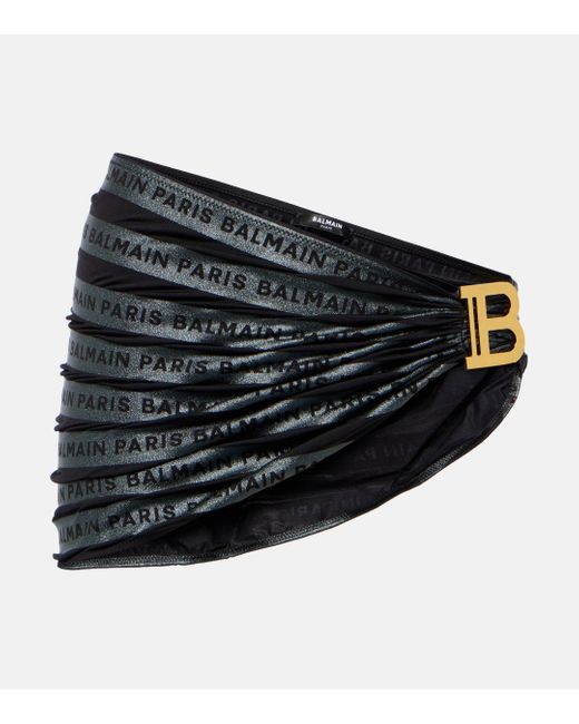 Pareo raye a logo Balmain en coloris Black