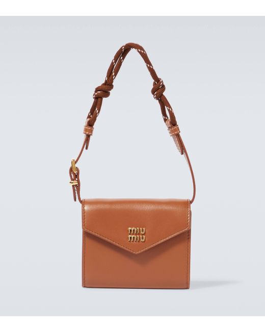 Miu Miu White Logo Leather Wallet With Strap for men