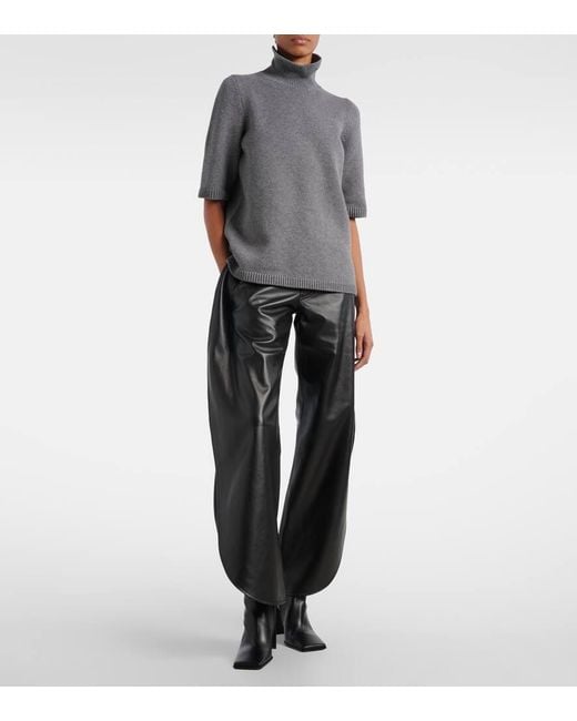 Alaïa Black High-Rise Leather Barrel-Leg Pants