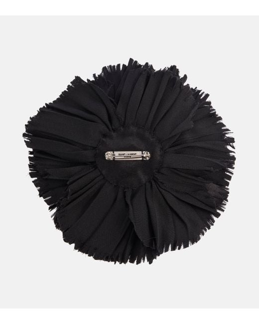Broche en satin de soie a fleurs Saint Laurent en coloris Black