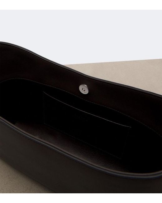 The Row Black Alma Small Leather Shoulder Bag