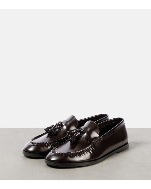 The Row Black Leather Penny Loafers