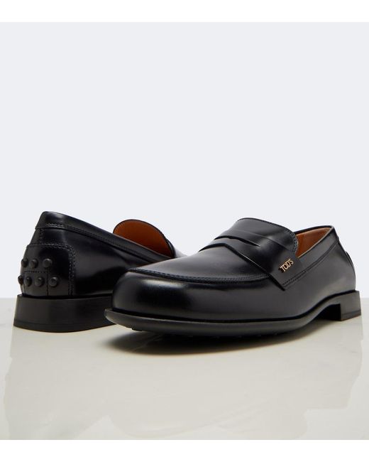 Tod's Black Leather Penny Loafers