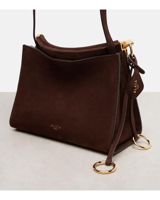 Sac Le Clic Small En Daim Alaïa en coloris Brown