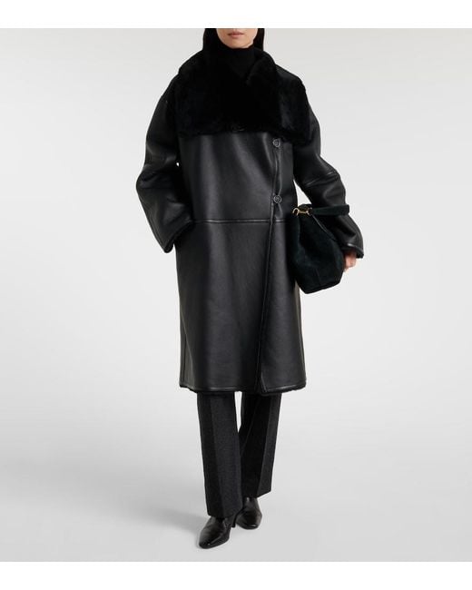 Totême Black Shearling-Lined Leather Coat