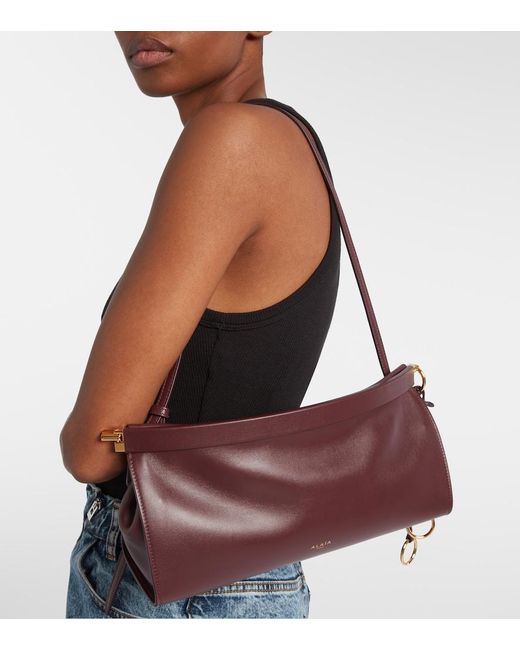 Alaïa Purple Le Click East West Medium Dark Red Bag