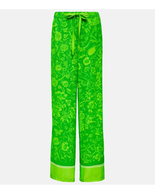 Pantalon ample a fleurs Gucci en coloris Green