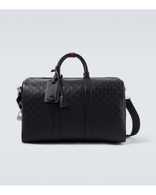Borsa Da Viaggio Gg Emblem Medium di Gucci in Black da Uomo