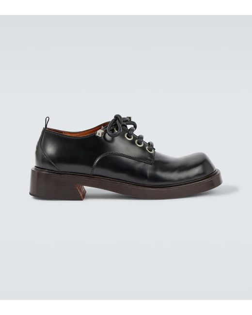 Mocassini di Alexander McQueen in Black da Uomo