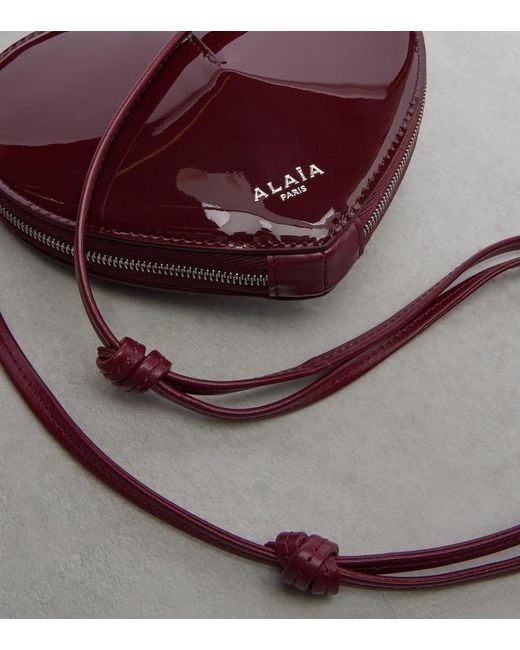 Alaïa White Le Cour Small Patent Leather Crossbody Bag