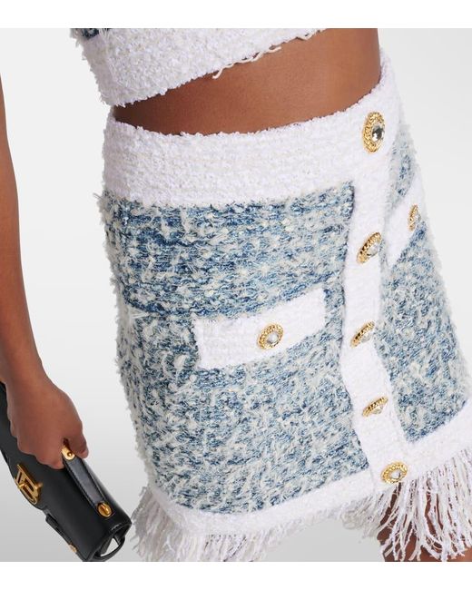 Minifalda de tweed de denim con flecos Balmain de color Blue