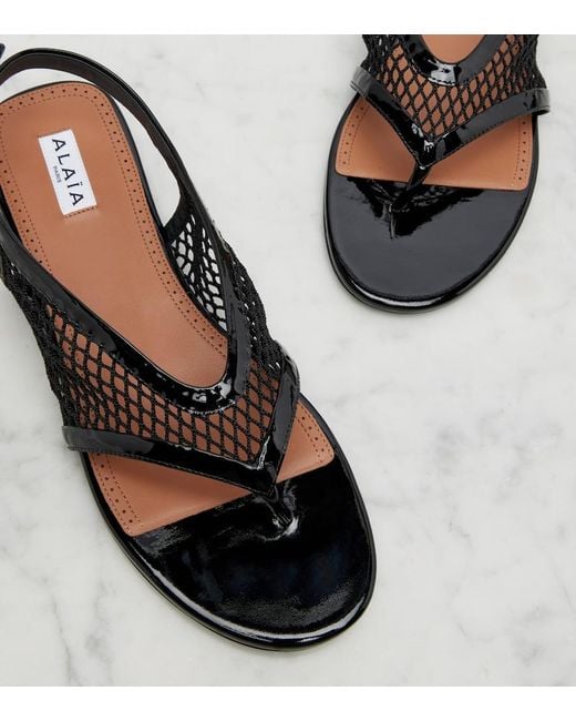 Alaïa Black Leather-Trimmed Fishnet Thong Sandals