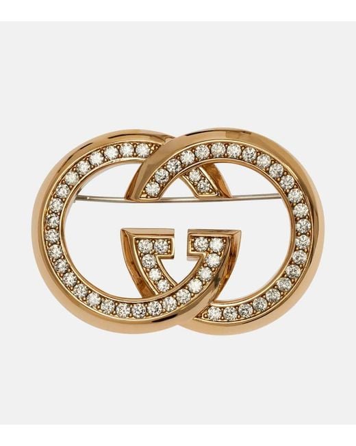 Broche Interlocking G A Ornements Gucci en coloris Metallic