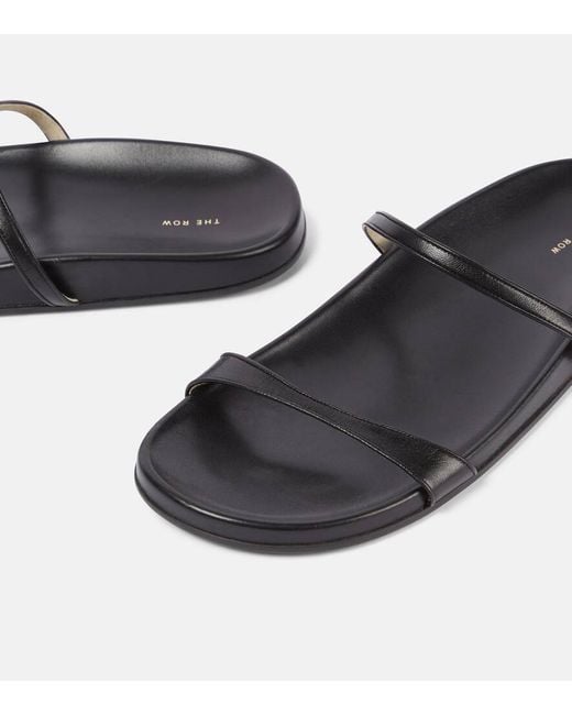 The Row Black Hugh Leather Slides