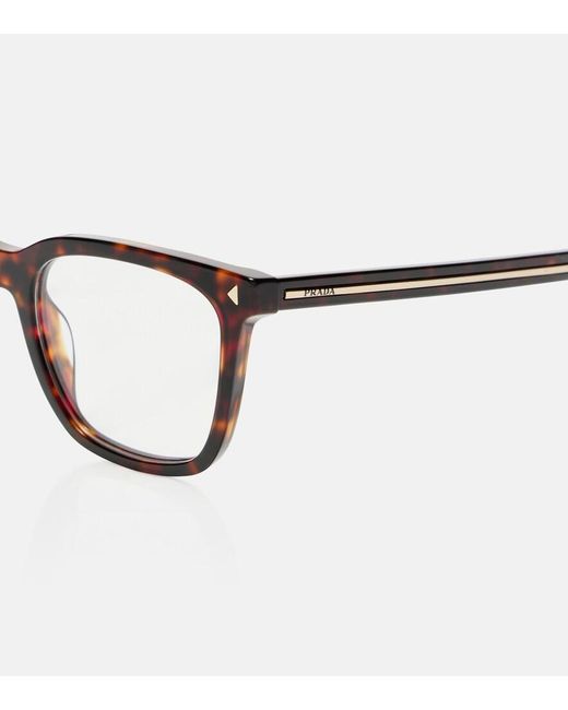 Lunettes Carrees Prada en coloris Brown