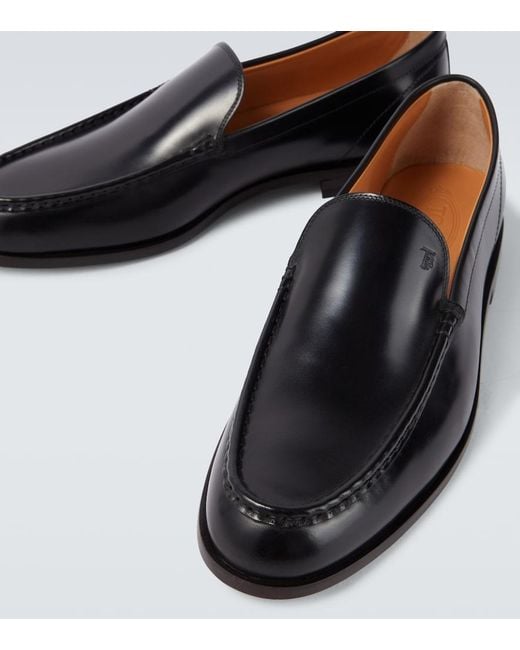 Tod's Black Leather Loafers for men