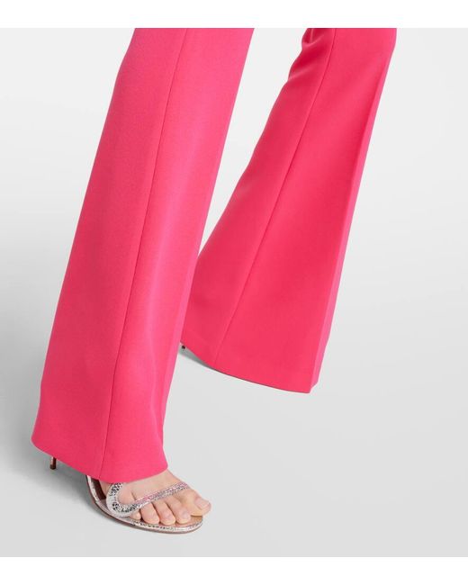 Pantalones flared Halluana de tiro alto Safiyaa de color Pink