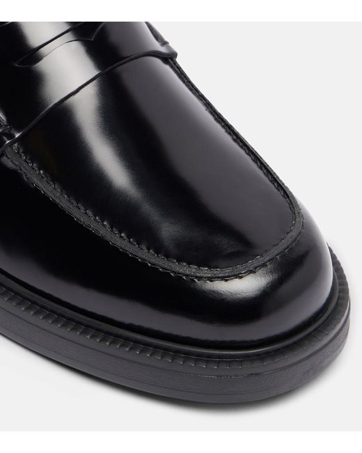 Tod's Black Leather Penny Loafers