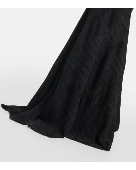 Robe longue a col roule Alaïa en coloris Black