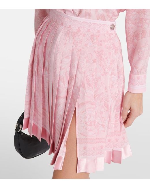 Minifalda Barocco de seda plisada Versace de color Pink