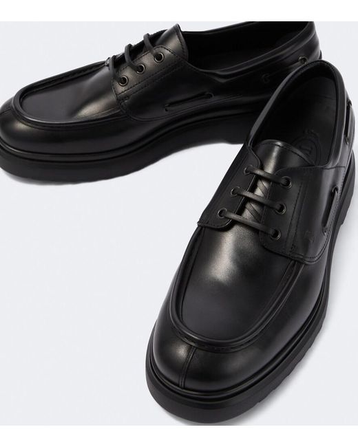 Tod's Black Leather Boat Shoes for men
