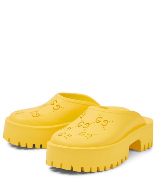 Gucci GG Rubber Clogs in Yellow Lyst