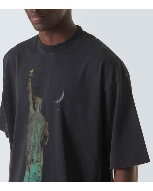 Balenciaga Oversized-T-Shirt aus Baumwoll-Jersey mit Print in Distressed-Optik in Black für Herren
