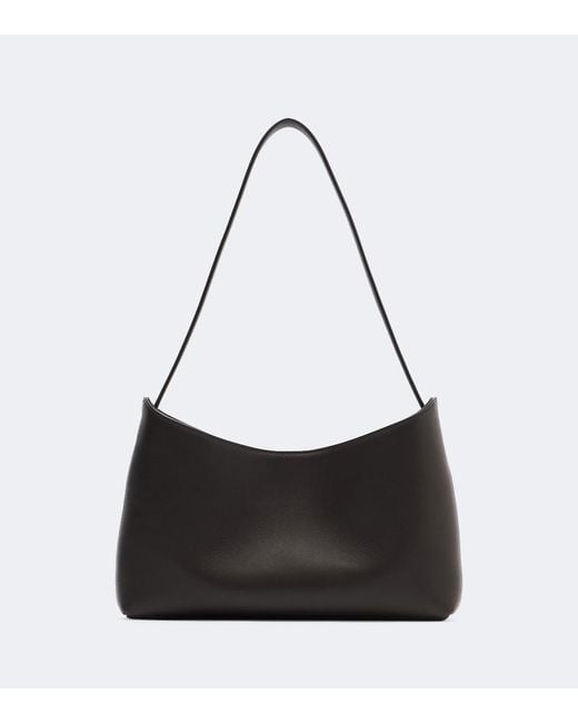 The Row Black Alma Small Leather Shoulder Bag