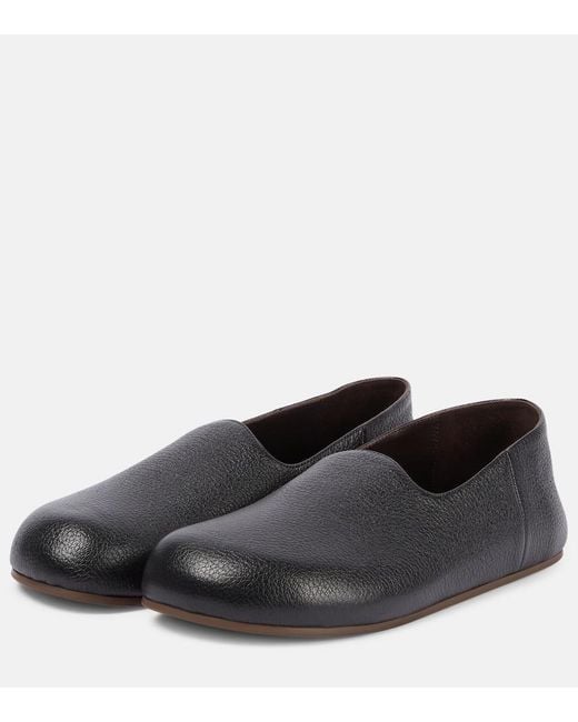 The Row Black Hugh Leather Slip-On Shoes