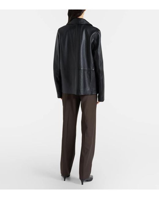 Pantalones Anchos Plisados Totême  de color Brown