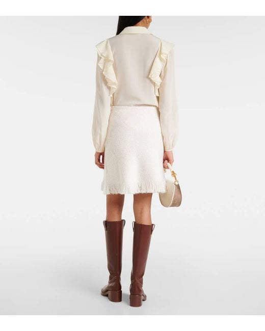 Minifalda De Punto Boucle Con Flecos Chloé de color White