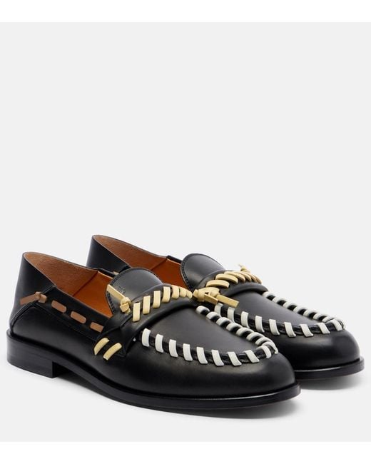 Tod's Black Leather Loafers