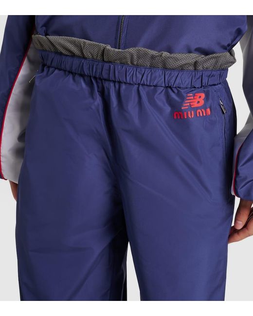 X New Balance Pantalones Deportivos De Popelin Miu Miu de color Blue