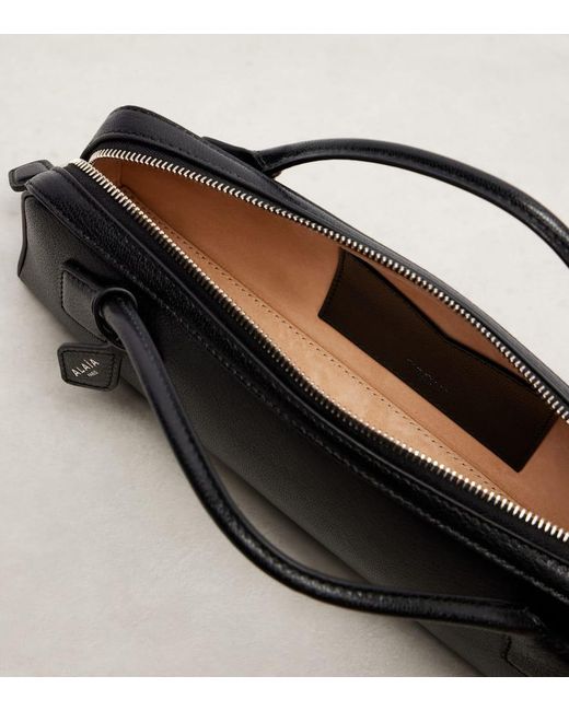 Alaïa Black Clutch Le Teckel Small Aus Leder