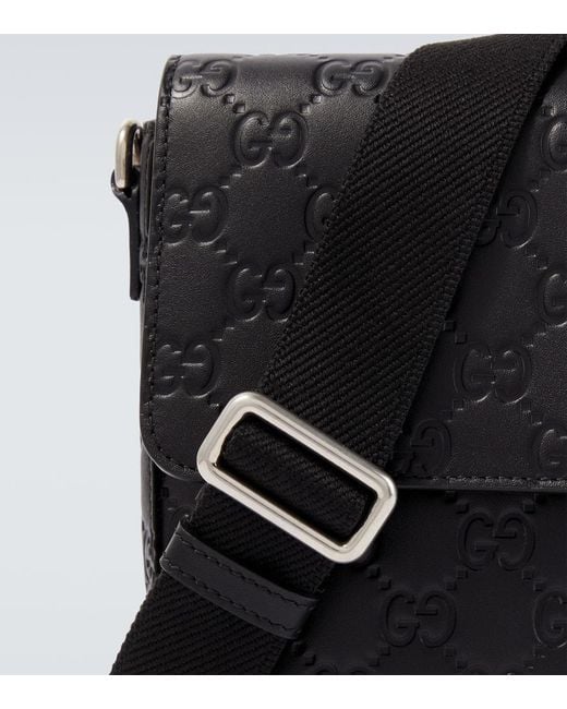 Gucci Black Gg Emblem Debossed Leather Phone Pouch for men