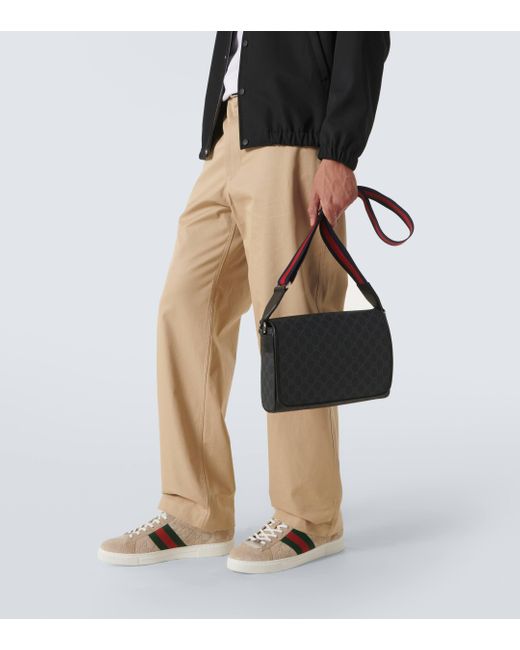 Gucci Leather Trimmed Gg Canvas Crossbody Bag in Black Lyst UK