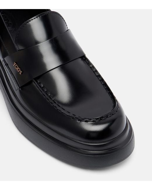 Tod's Black Leather Loafers