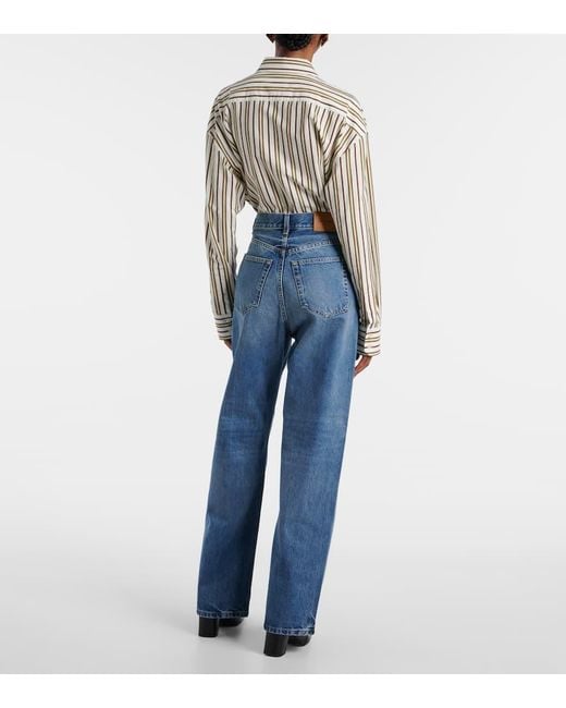 Jeans A Gamba Larga V-Waist di Saint Laurent in Blue
