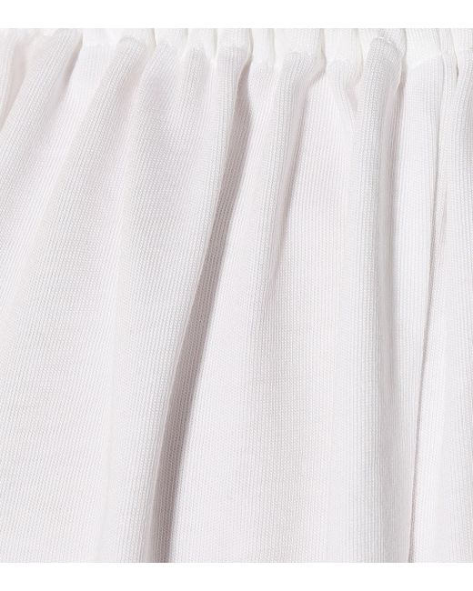 the row white gown