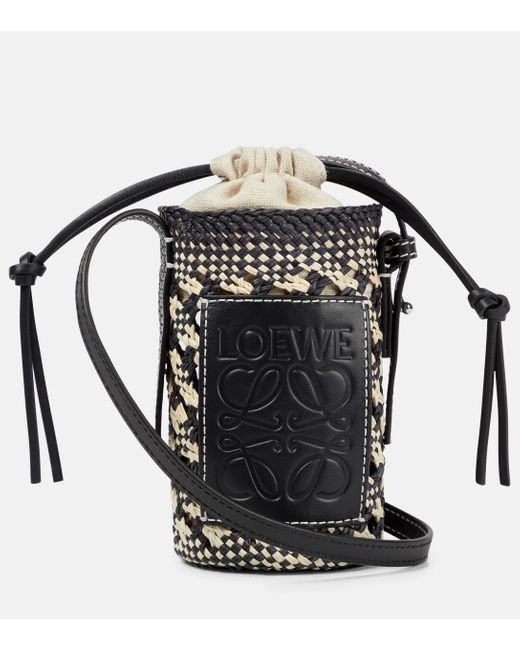 Loewe Cylinder Leathertrimmed Raffia Crossbody Bag in Black Lyst UK