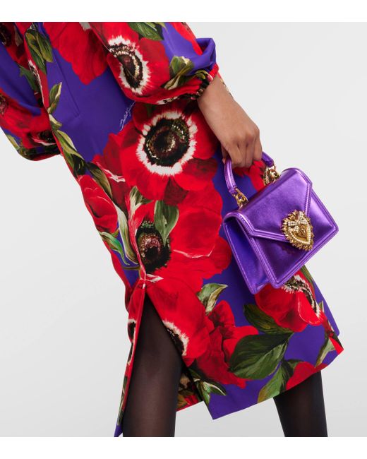 Jupe crayon en soie melangee a fleurs Dolce & Gabbana en coloris Red