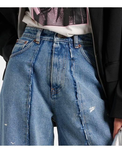 Jeans a gamba larga distressed di MM6 by Maison Martin Margiela in Blue