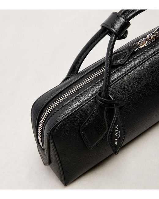 Alaïa Black Clutch Le Teckel Small Aus Leder