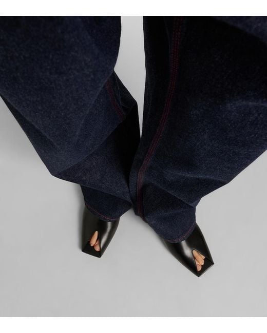 Alaïa Black Leather Slippers
